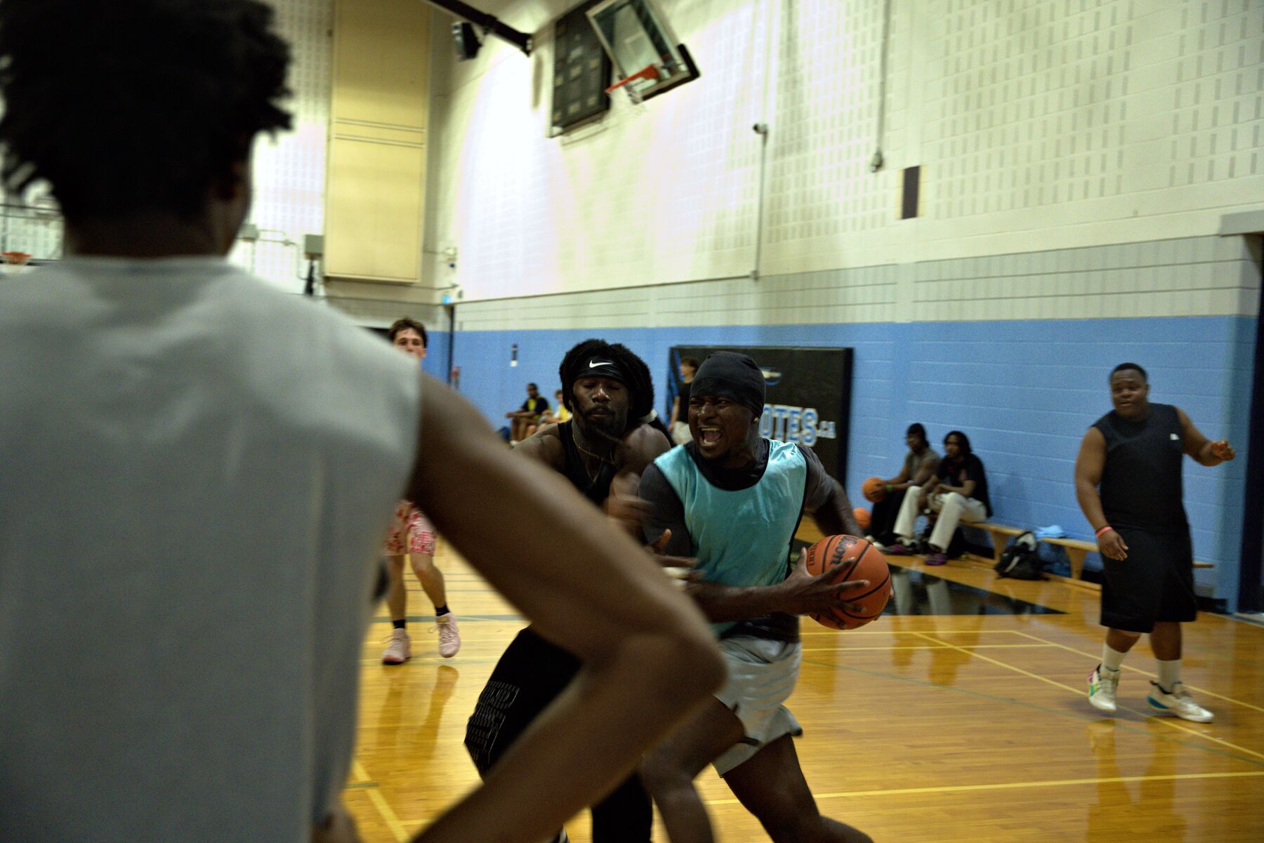 A player attacking the basket at a Real Victors run